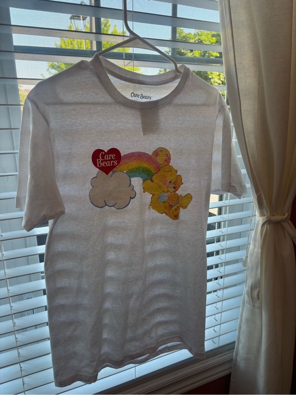 Care Bears White Tee with Yellow Bear and Rainbow Graphic